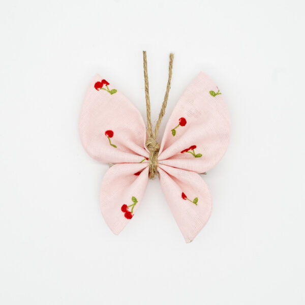 pinza mariposa rosa cerezas