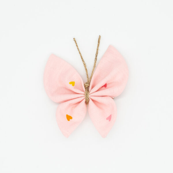 pinza mariposa rosa corazones