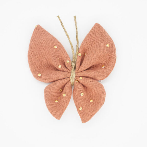 Mariposa color teja con topos oro